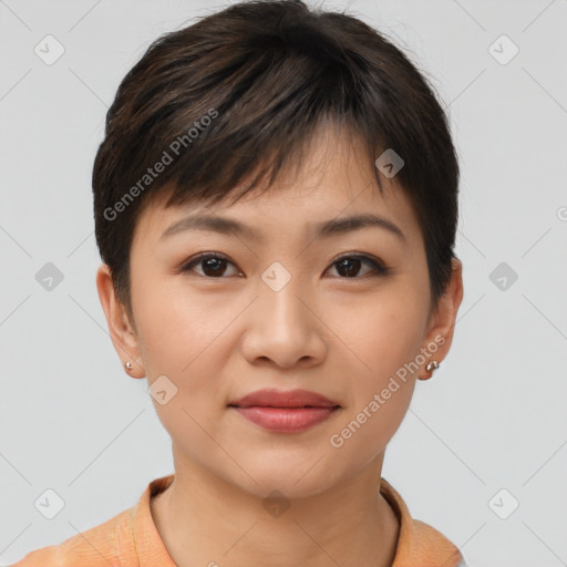 Joyful asian young-adult female with short  brown hair and brown eyes