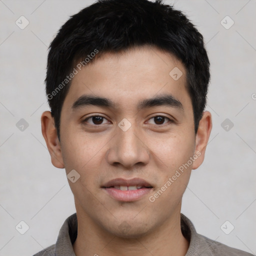 Joyful asian young-adult male with short  black hair and brown eyes