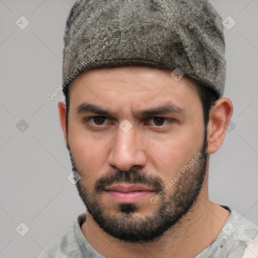 Neutral white young-adult male with short  black hair and brown eyes