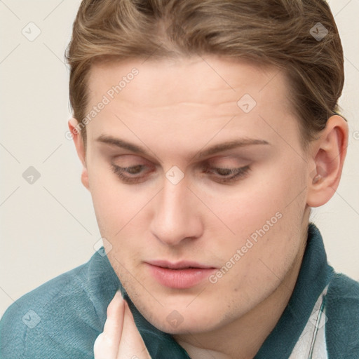 Neutral white young-adult male with short  brown hair and blue eyes