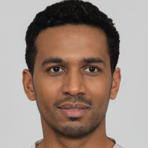 Neutral black young-adult male with short  black hair and brown eyes