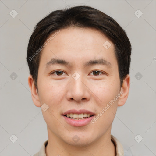 Joyful asian young-adult male with short  brown hair and brown eyes