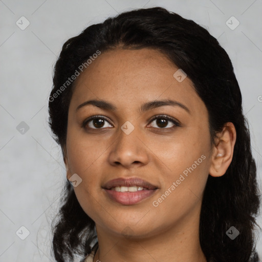 Joyful latino young-adult female with long  black hair and brown eyes