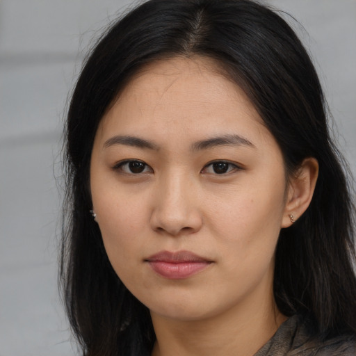 Neutral asian young-adult female with long  brown hair and brown eyes