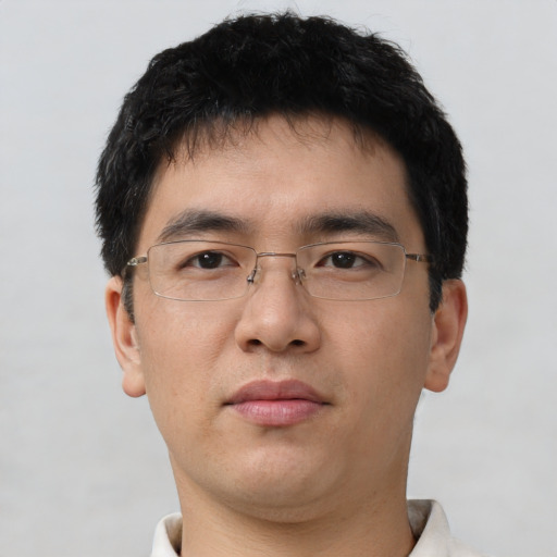 Neutral asian young-adult male with short  brown hair and brown eyes