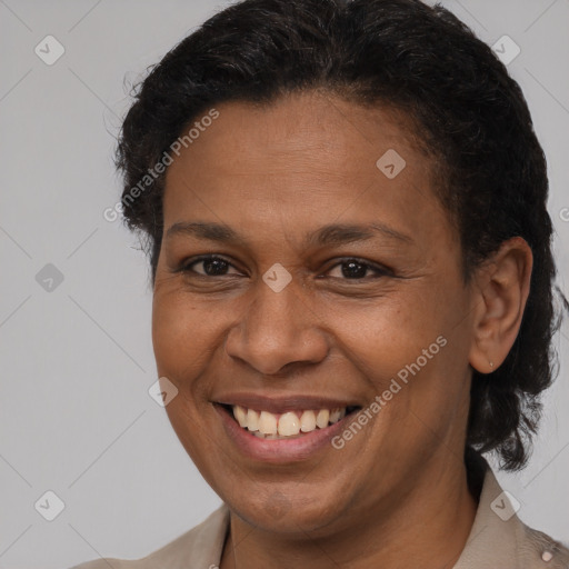 Joyful black adult female with short  brown hair and brown eyes