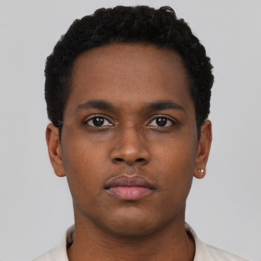 Neutral black young-adult male with short  brown hair and brown eyes