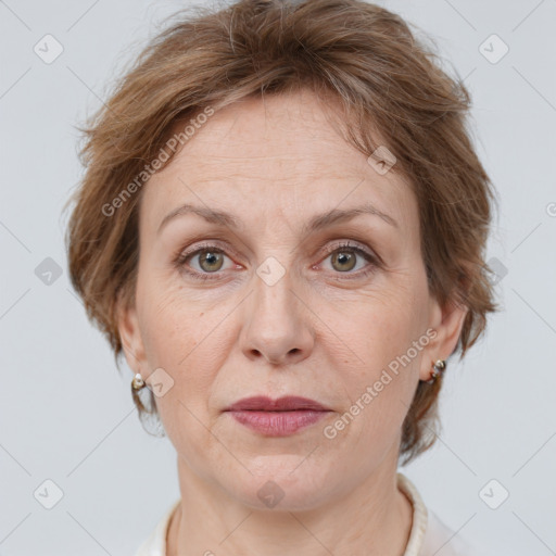 Joyful white adult female with medium  brown hair and grey eyes