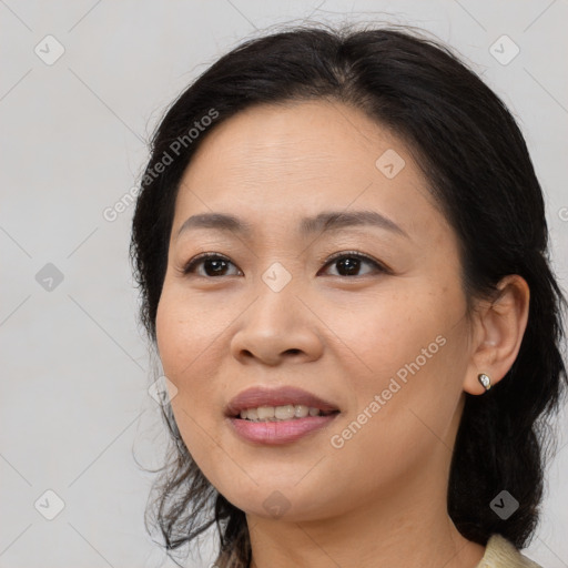 Joyful asian young-adult female with medium  brown hair and brown eyes