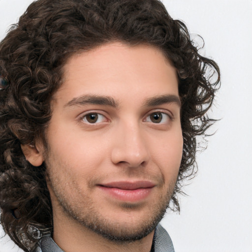 Neutral white young-adult male with long  brown hair and brown eyes