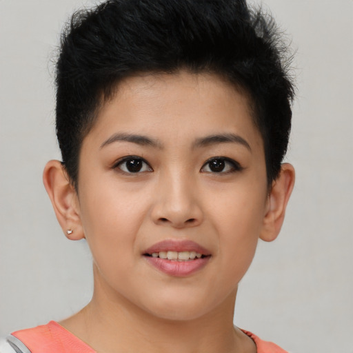 Joyful asian young-adult female with short  brown hair and brown eyes