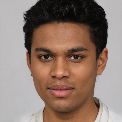 Neutral latino young-adult male with short  black hair and brown eyes