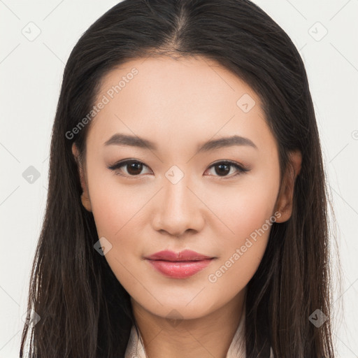 Joyful asian young-adult female with long  brown hair and brown eyes