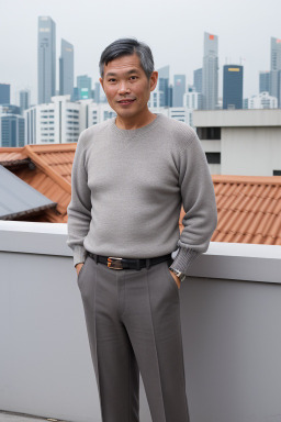 Singaporean middle-aged male with  gray hair