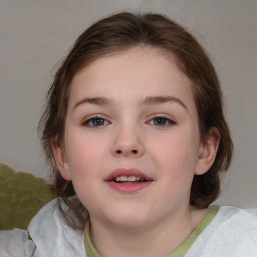 Joyful white child female with medium  brown hair and blue eyes