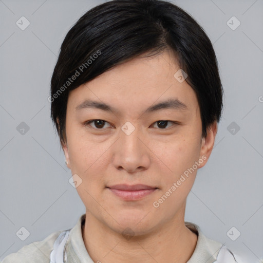 Joyful asian young-adult female with short  brown hair and brown eyes