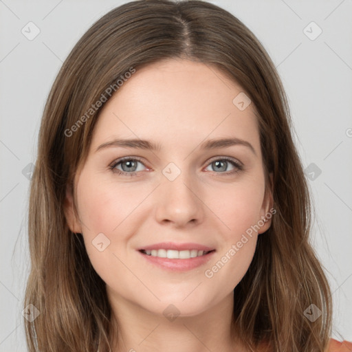 Joyful white young-adult female with long  brown hair and grey eyes