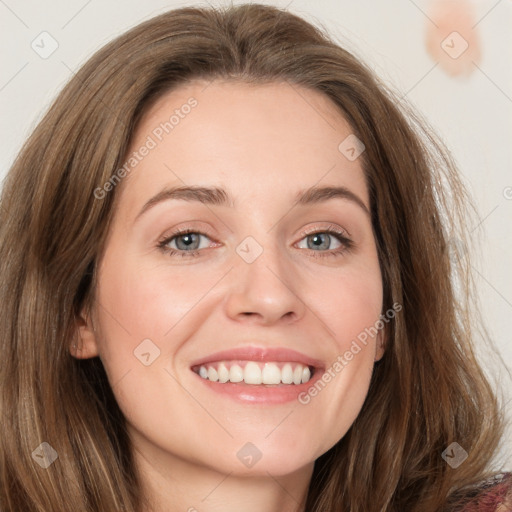 Joyful white young-adult female with medium  brown hair and blue eyes