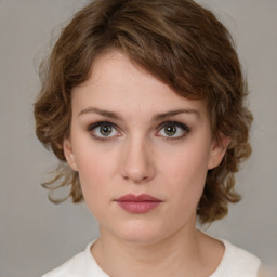 Neutral white young-adult female with medium  brown hair and green eyes