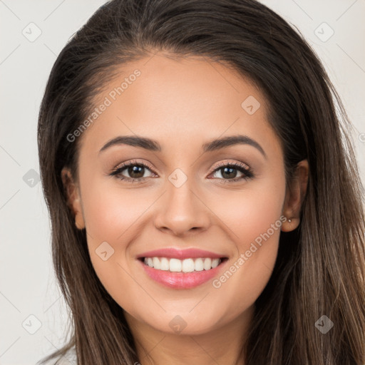 Joyful white young-adult female with long  brown hair and brown eyes