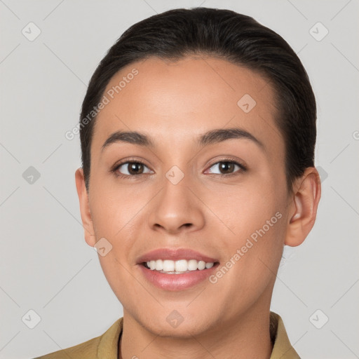 Joyful white young-adult female with short  brown hair and brown eyes