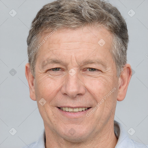 Joyful white middle-aged male with short  brown hair and brown eyes