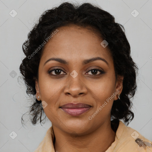 Joyful black young-adult female with long  brown hair and brown eyes