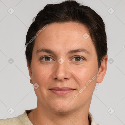 Joyful white adult male with short  brown hair and grey eyes