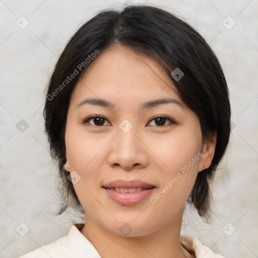 Joyful asian young-adult female with medium  brown hair and brown eyes