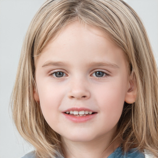 Joyful white child female with medium  brown hair and grey eyes