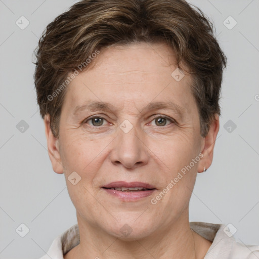 Joyful white adult female with short  brown hair and brown eyes