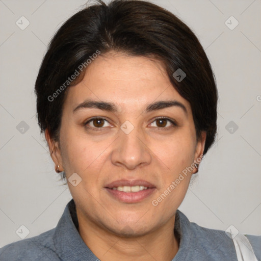 Joyful white adult female with short  brown hair and brown eyes