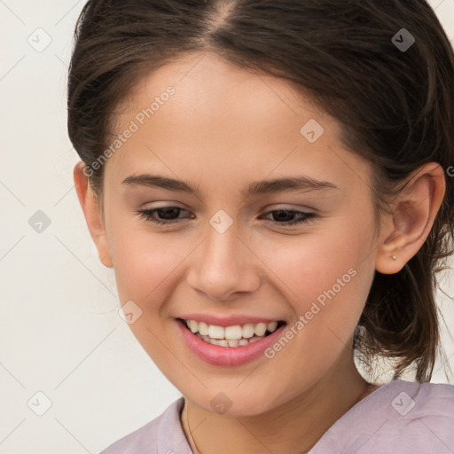 Joyful white child female with medium  brown hair and brown eyes