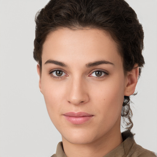 Neutral white young-adult female with short  brown hair and brown eyes