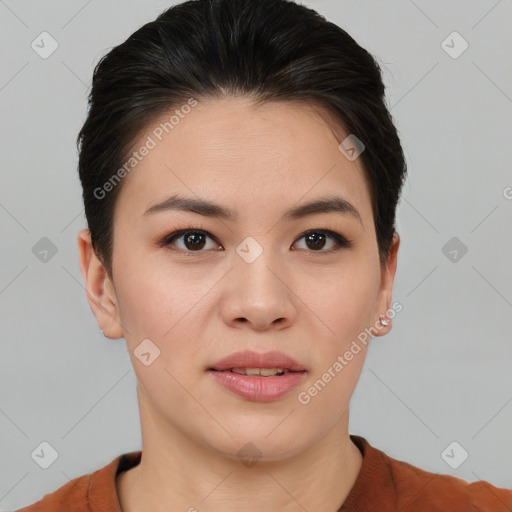 Joyful asian young-adult female with short  brown hair and brown eyes