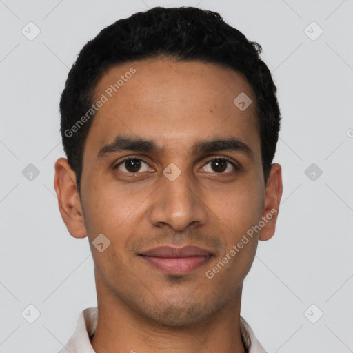 Joyful latino young-adult male with short  black hair and brown eyes