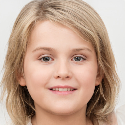 Joyful white child female with medium  brown hair and grey eyes