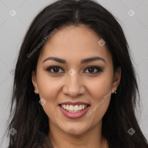 Joyful latino young-adult female with long  brown hair and brown eyes