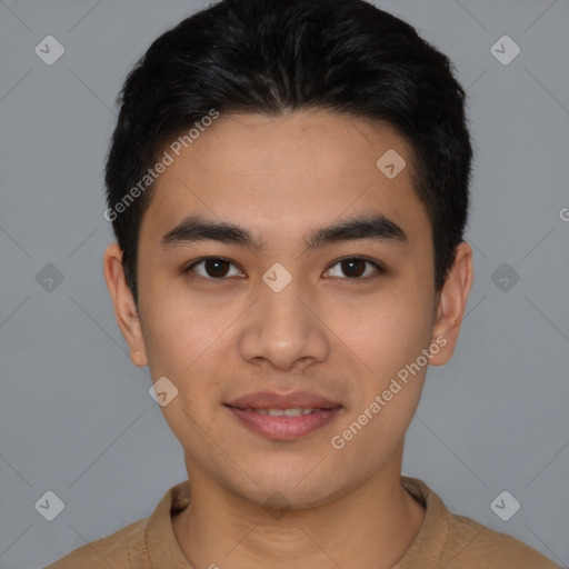 Joyful latino young-adult male with short  brown hair and brown eyes