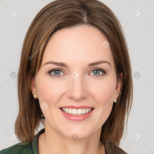 Joyful white young-adult female with medium  brown hair and green eyes