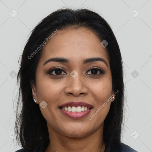 Joyful latino young-adult female with long  brown hair and brown eyes