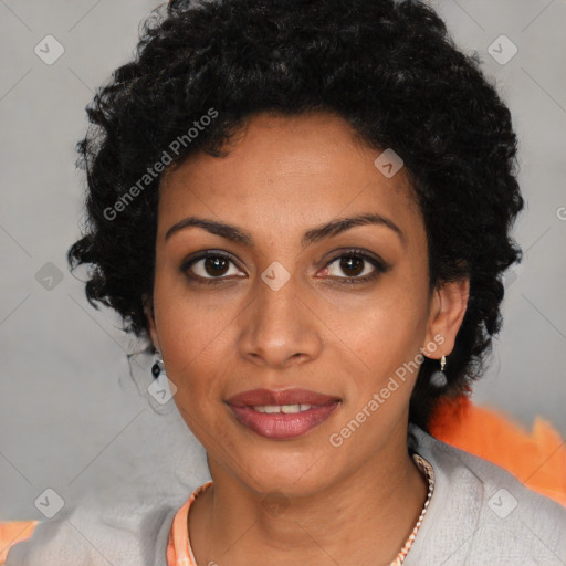 Joyful latino young-adult female with short  black hair and brown eyes