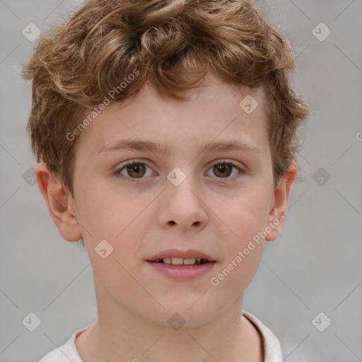 Joyful white child male with short  brown hair and brown eyes