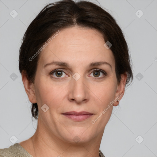 Joyful white adult female with medium  brown hair and grey eyes