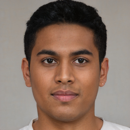 Neutral latino young-adult male with short  black hair and brown eyes