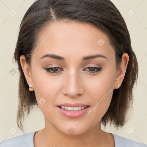 Joyful white young-adult female with medium  brown hair and brown eyes