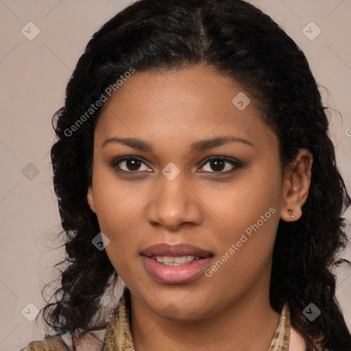 Joyful black young-adult female with long  brown hair and brown eyes