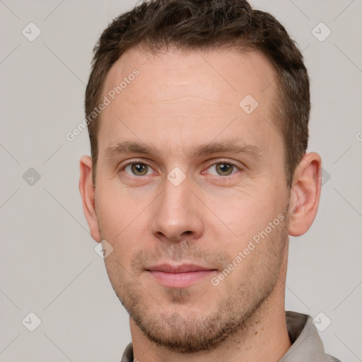 Neutral white young-adult male with short  brown hair and grey eyes