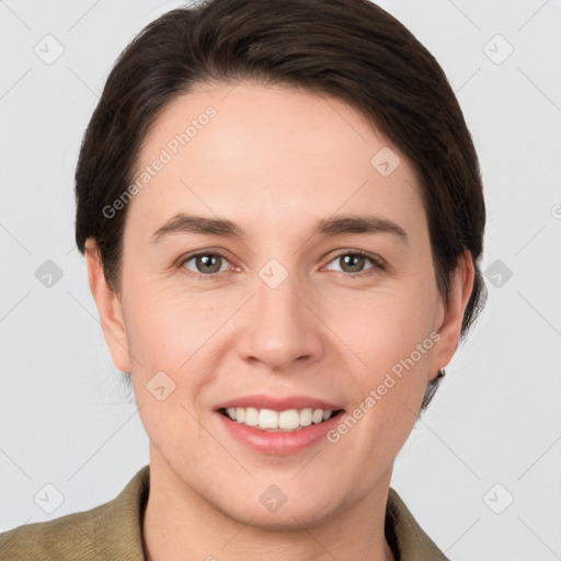 Joyful white young-adult female with short  brown hair and brown eyes