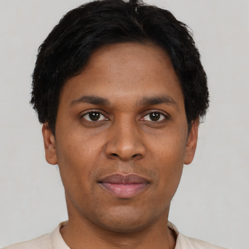 Neutral black young-adult male with short  brown hair and brown eyes